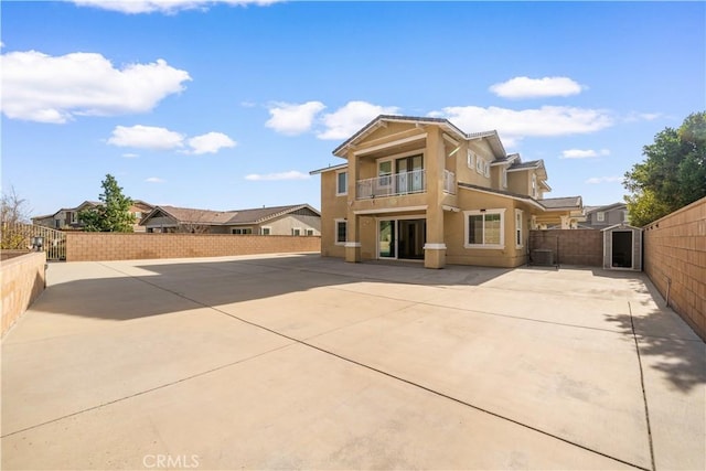 rear view of house with a patio area