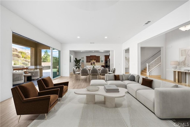 living room featuring light wood-type flooring