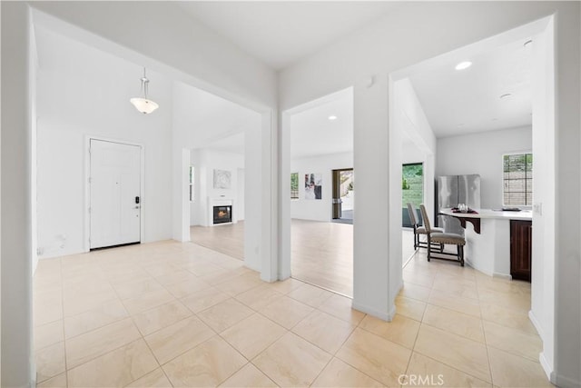 entrance foyer featuring light tile patterned floors