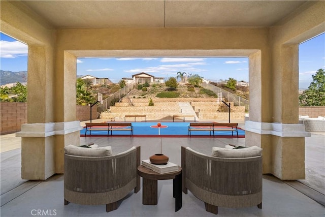 view of patio featuring a mountain view