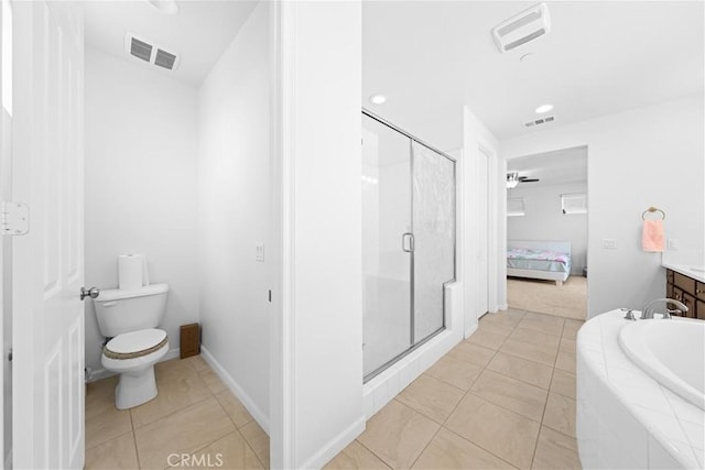 full bathroom featuring ceiling fan, vanity, tile patterned flooring, separate shower and tub, and toilet