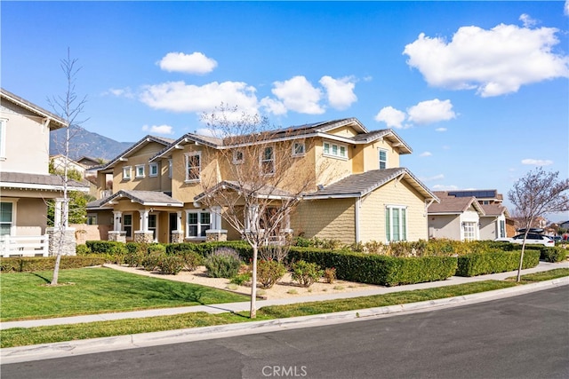 view of front of house featuring a front lawn