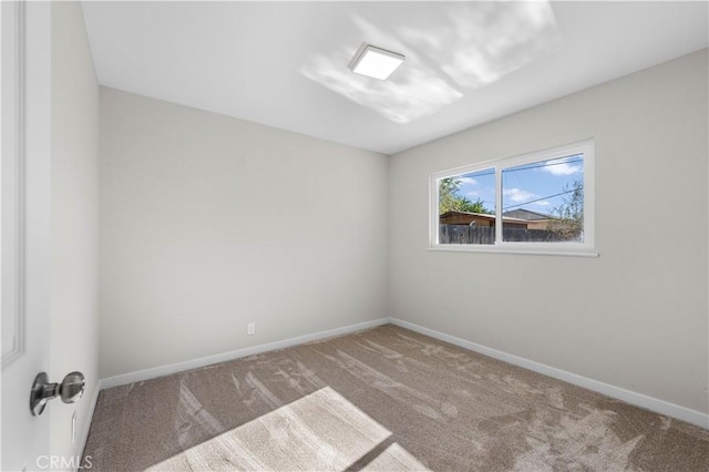 view of carpeted spare room