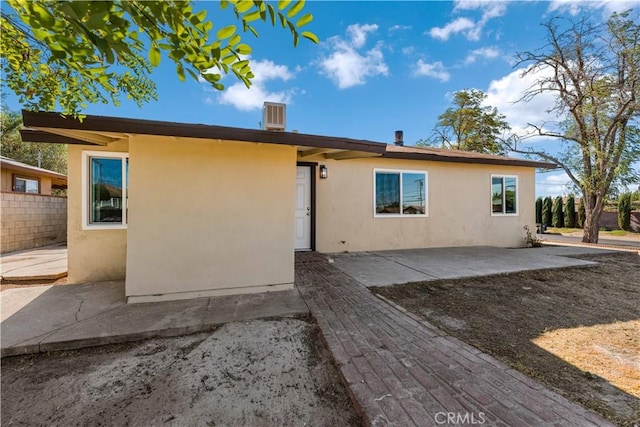 rear view of property with a patio