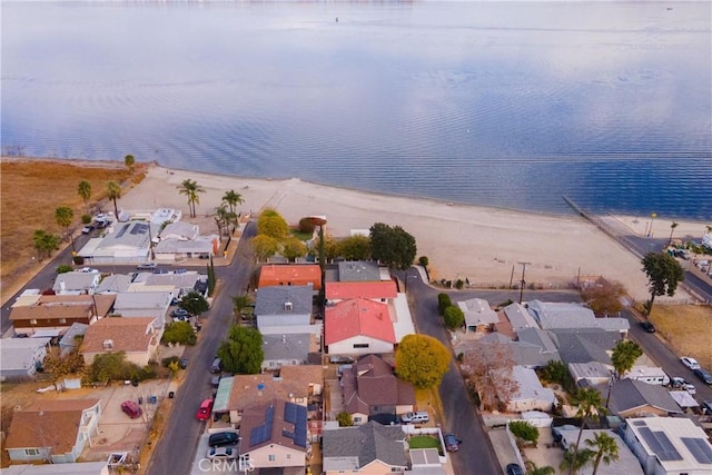 bird's eye view with a water view and a view of the beach