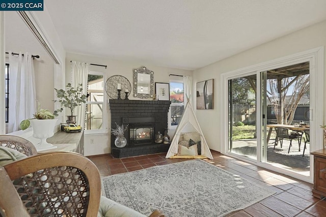 living area with dark tile patterned floors