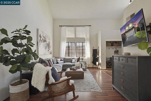 living room featuring dark hardwood / wood-style floors