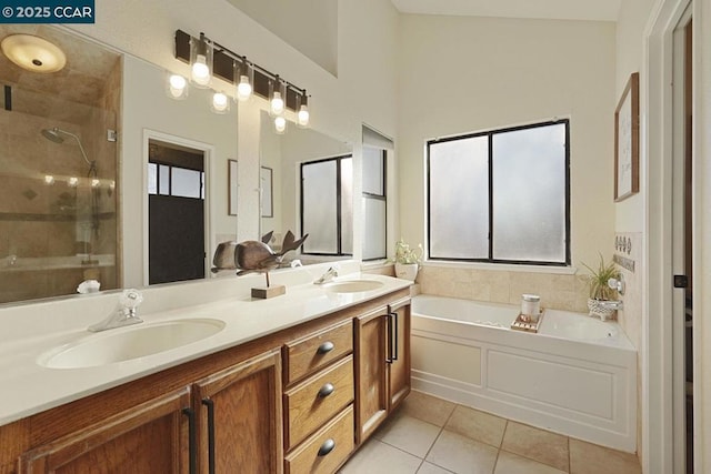 bathroom with vanity, independent shower and bath, and tile patterned floors