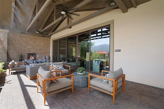 view of patio featuring outdoor lounge area and ceiling fan