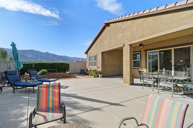 view of patio featuring a mountain view