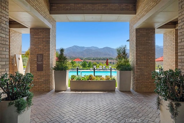 view of patio with a mountain view