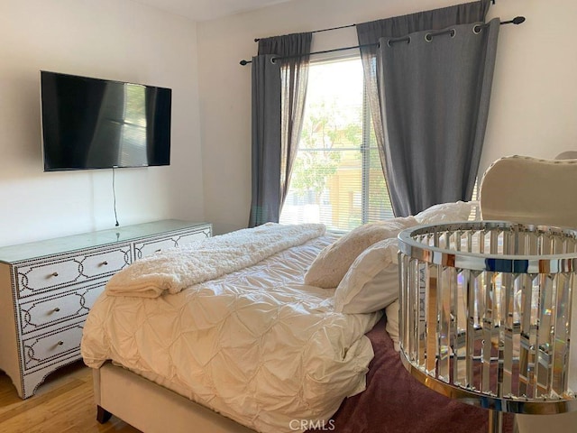 bedroom featuring hardwood / wood-style flooring