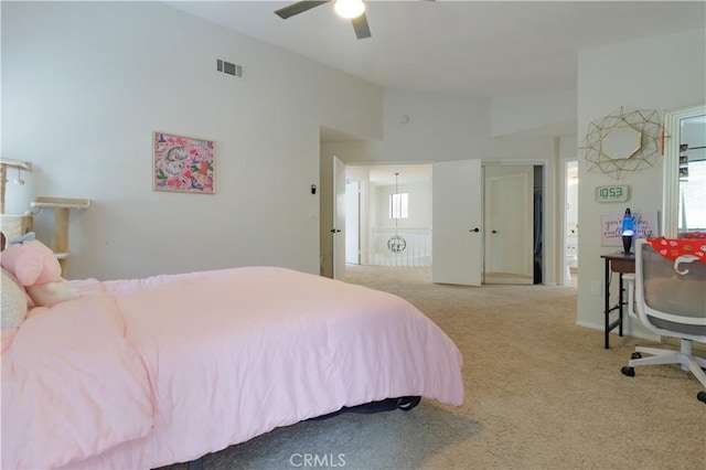 bedroom featuring light carpet, ceiling fan, and lofted ceiling