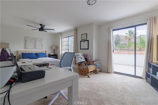 bedroom featuring ceiling fan, carpet, access to outside, and multiple windows