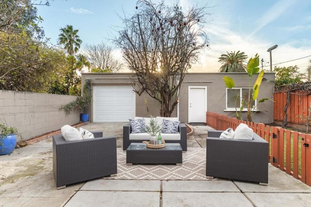 patio terrace at dusk with an outdoor hangout area