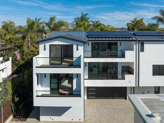 back of property with solar panels