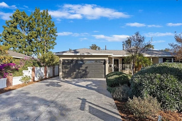 ranch-style home with a garage