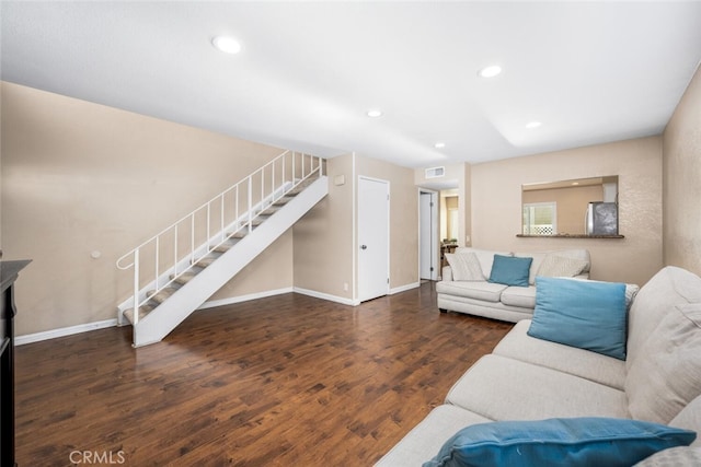 living room with dark hardwood / wood-style floors