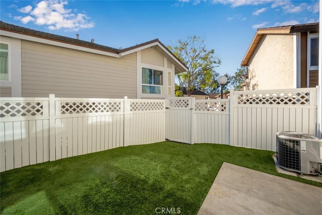 view of yard featuring central AC