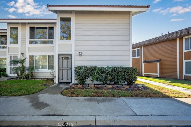 exterior space with a front yard