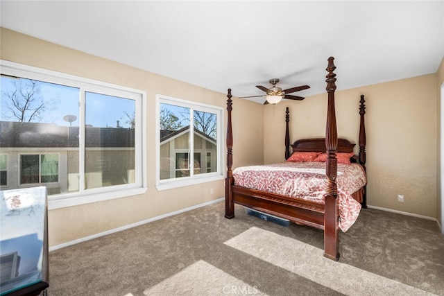 bedroom with ceiling fan and carpet