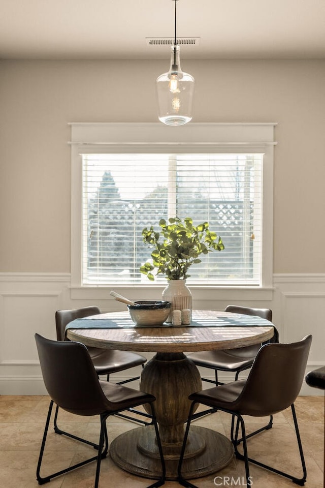 dining space with a healthy amount of sunlight