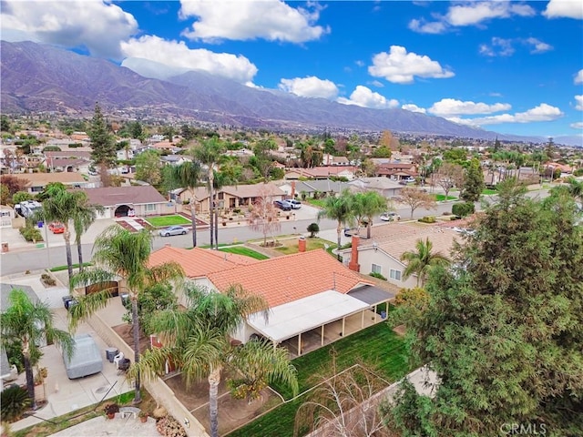 drone / aerial view featuring a mountain view