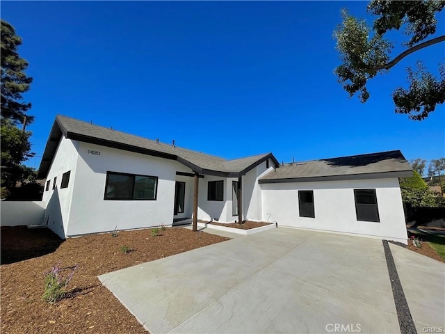 view of front of home with a patio area