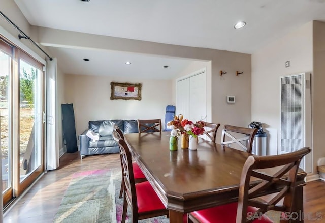 dining room with hardwood / wood-style floors