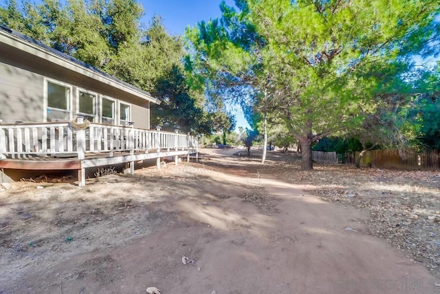 view of yard with a deck