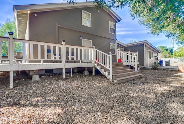 rear view of house with a deck