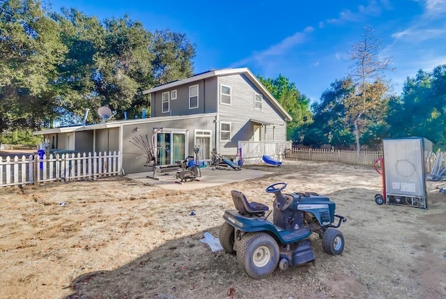 back of house featuring a patio