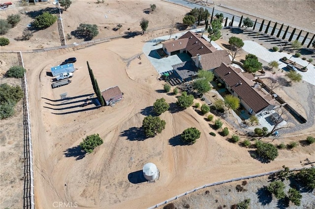 drone / aerial view with view of desert