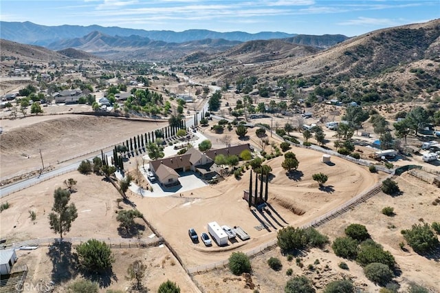 drone / aerial view featuring a mountain view