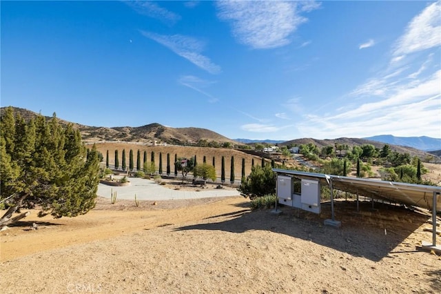 view of mountain feature with a rural view