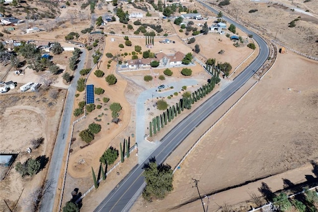 aerial view featuring view of desert and a rural view