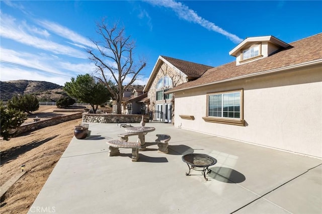 view of patio featuring a mountain view