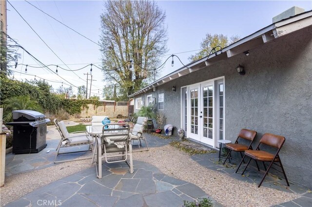 view of patio / terrace featuring area for grilling and french doors