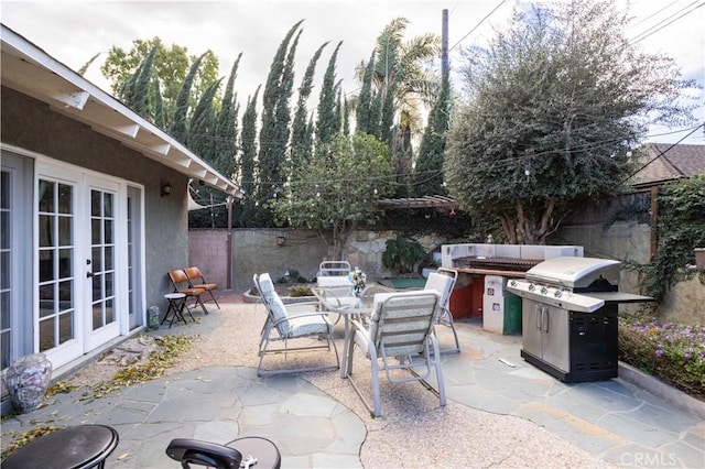 view of patio / terrace featuring french doors