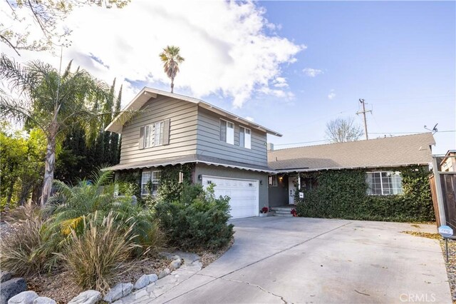 front facade with a garage