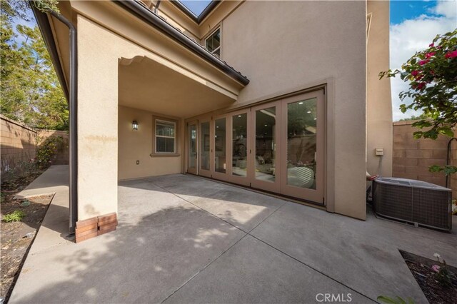 view of patio featuring central AC unit