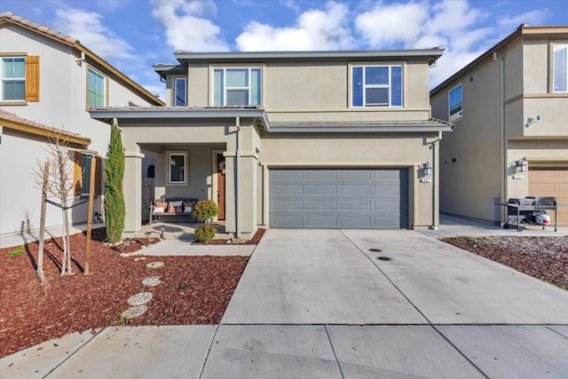 front of property featuring a garage