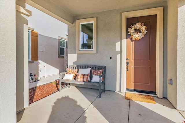 doorway to property with covered porch