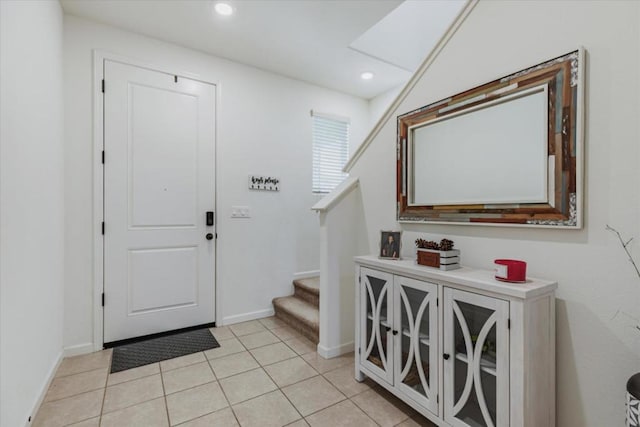 entrance foyer with light tile patterned flooring