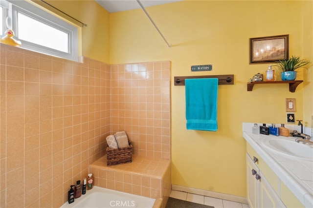 bathroom featuring tile patterned flooring, vanity, and bathtub / shower combination