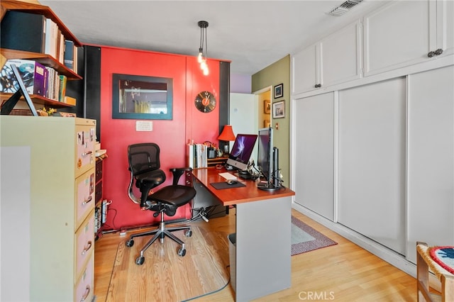 office area with light wood-type flooring