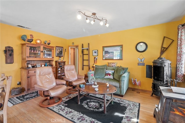 living room with light hardwood / wood-style floors