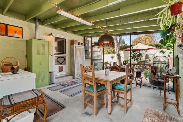 sunroom with beam ceiling