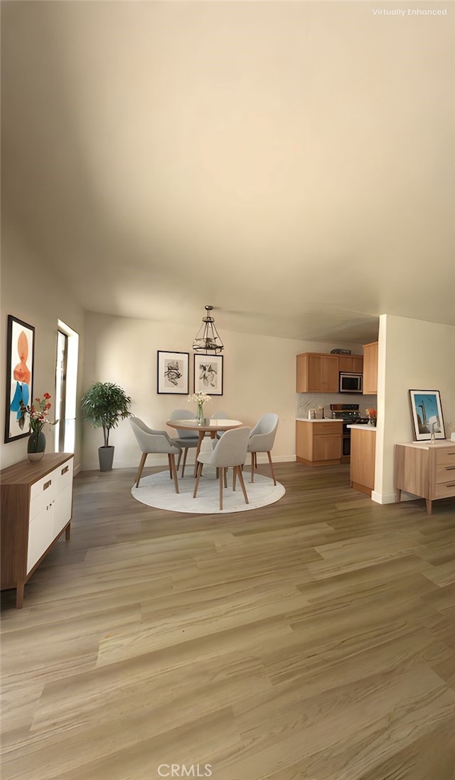 dining room featuring light wood-type flooring