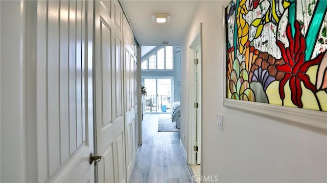 hallway featuring light wood finished floors